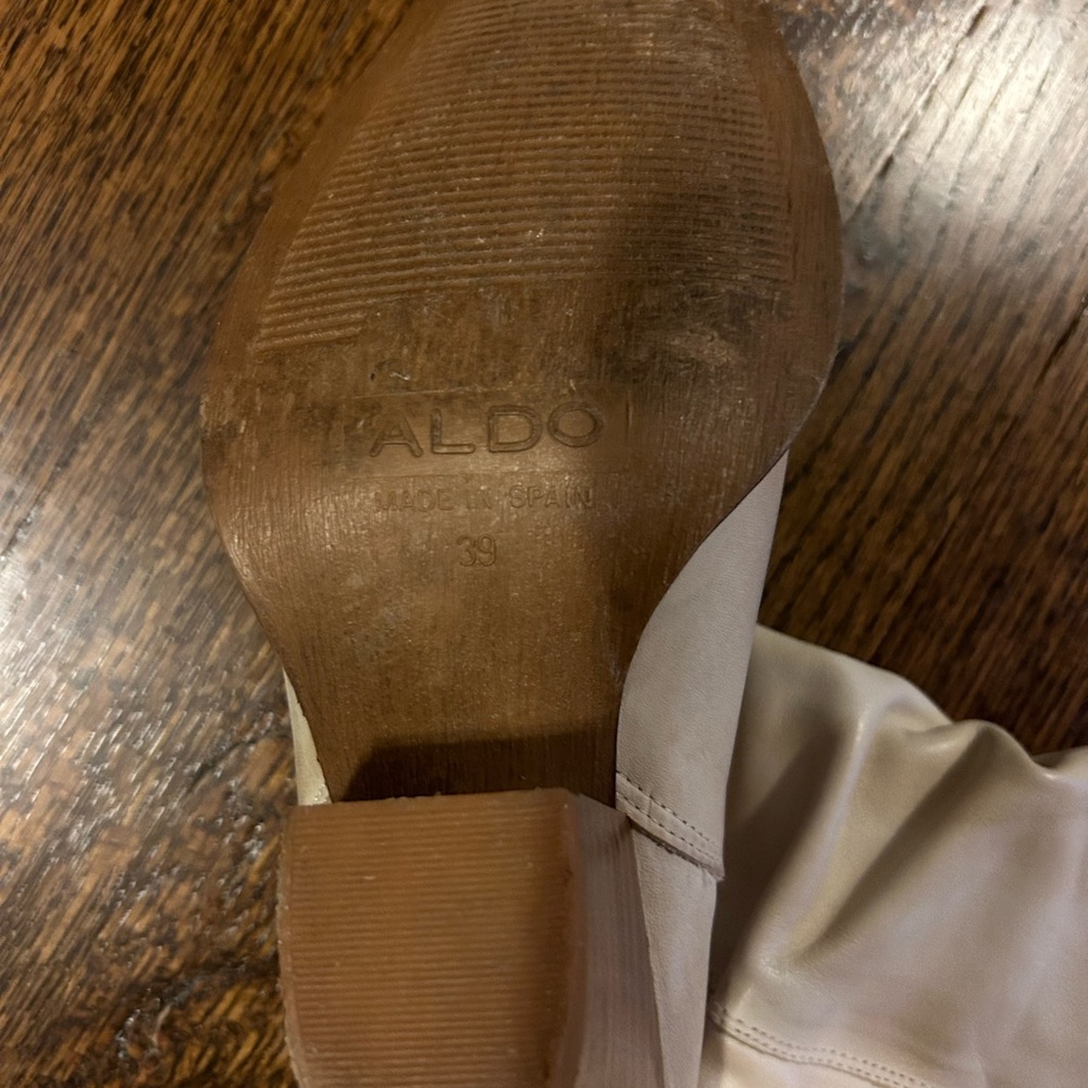 Aldo cowgirl boots.
